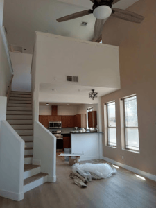 Living room with new paint and stairs