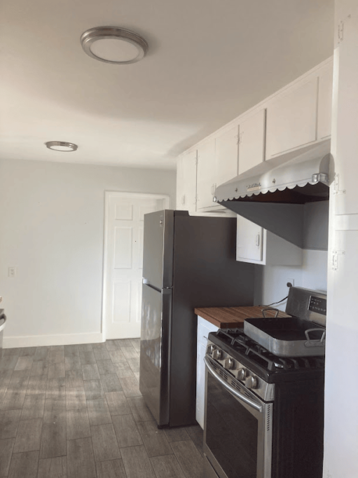 Kitchen with new paint and appliances