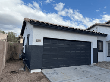 House with new paint and a garage