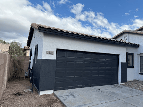 House with new paint and a garage