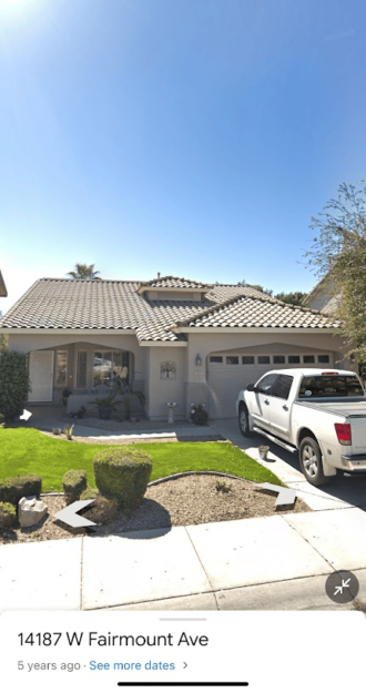 See our work: Exterior of a beige single-family home with a tile roof.