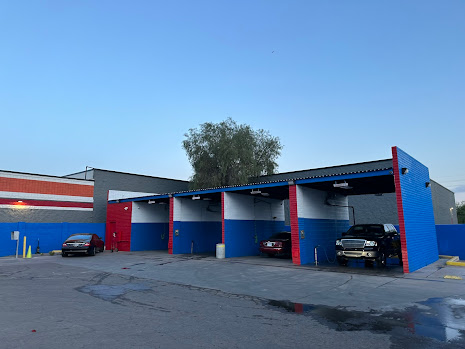 Car wash with bright blue and red painted exterior