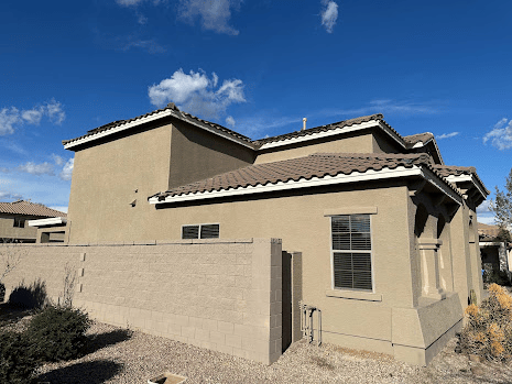 House with painted exterior and a blue sky
