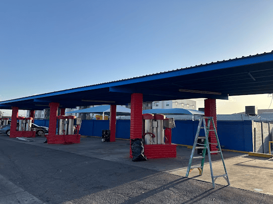 Gas station undergoing painting