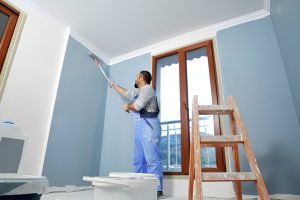 Painter man at work
